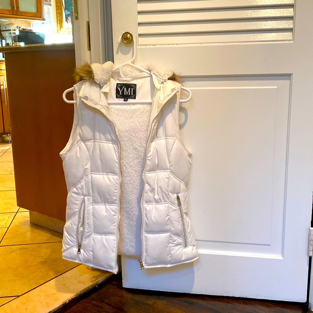 White faux fur inside vest with a hood with faux fur size M